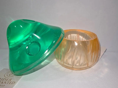 3" handmade epoxy resin mushroom pot — emerald green cap removed beside amber ribbed base, Rider Enchanted Studio card